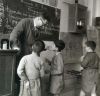 0_Robert_DOISNEAU-_La_lecon_de_conjugaison-_1956.jpg