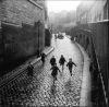 1955_Paris_-_Calvalcade_rue_Saint-Vincent_a_Montmartre.jpg