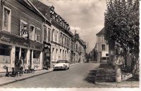 PUISEAUX-rue-de-paris-carte-postale-ancienne.jpg